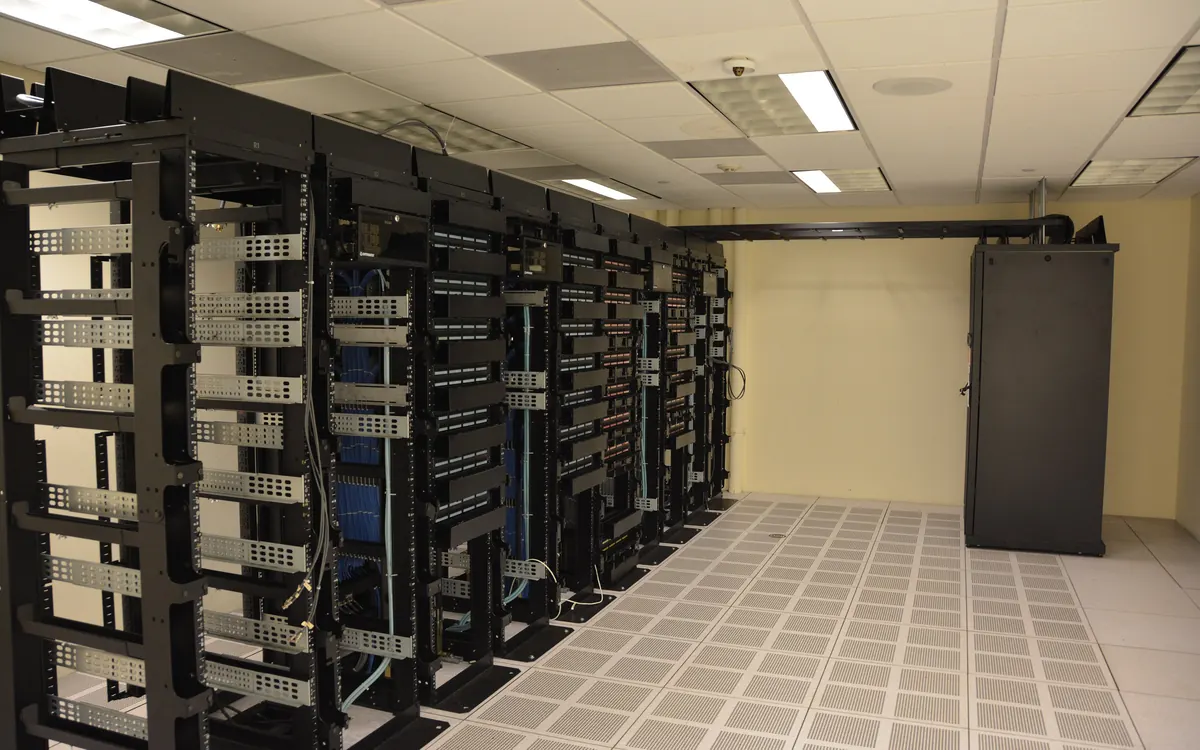 Rows of server racks in a data centre, the kind of machines many bitcoin nodes run on (illustrative photo)