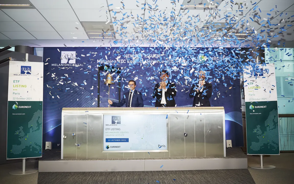 Confetti falls at a bitcoin ETF listing ceremony on the Euronext stage in Paris (illustrative photo)