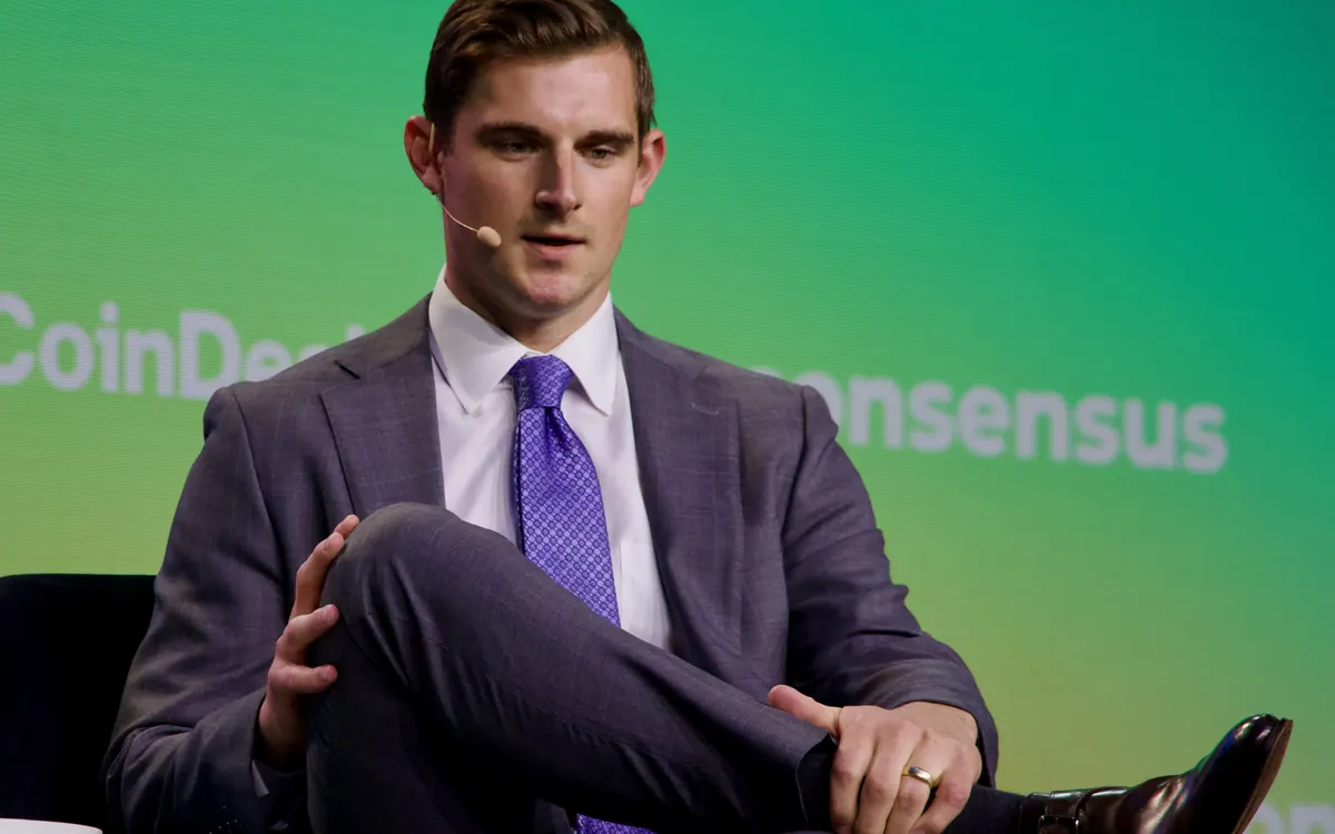 Bo Hines speaking on stage at Consensus 2025