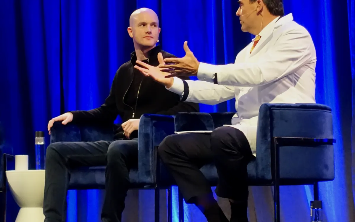 Coinbase CEO Brian Armstrong in a stage conversation (illustrative photo)