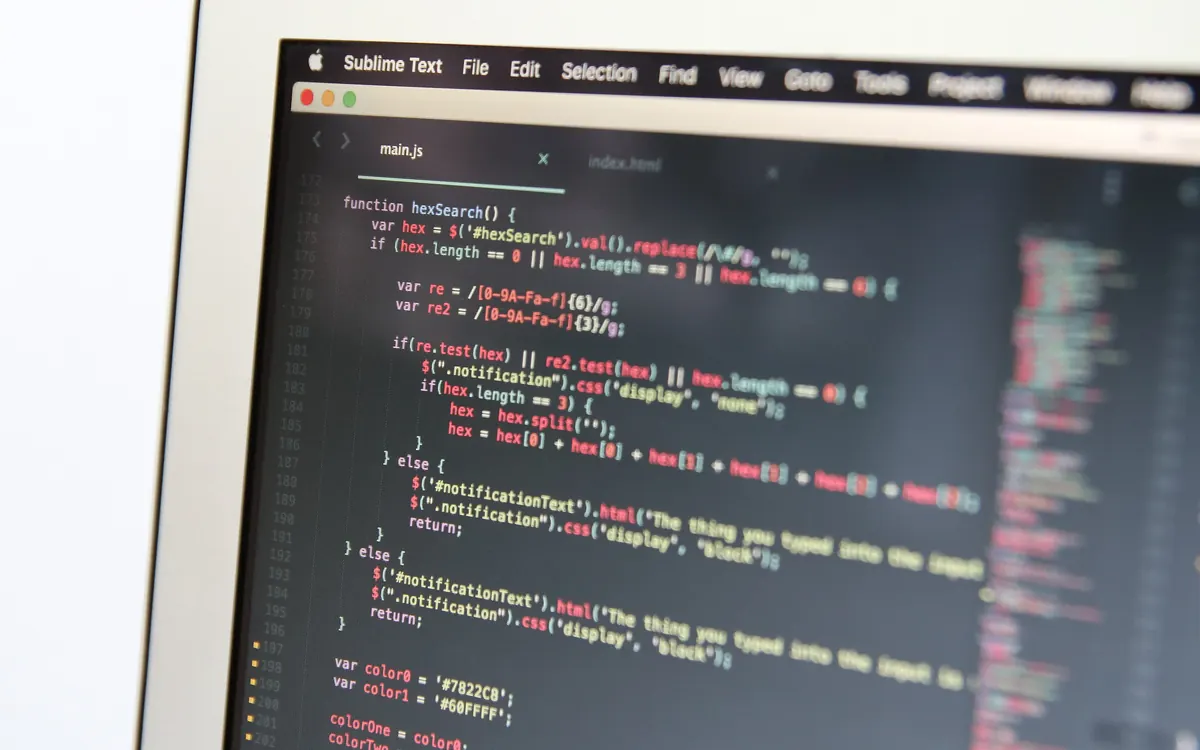 Close-up of source code on a laptop screen (illustrative photo)