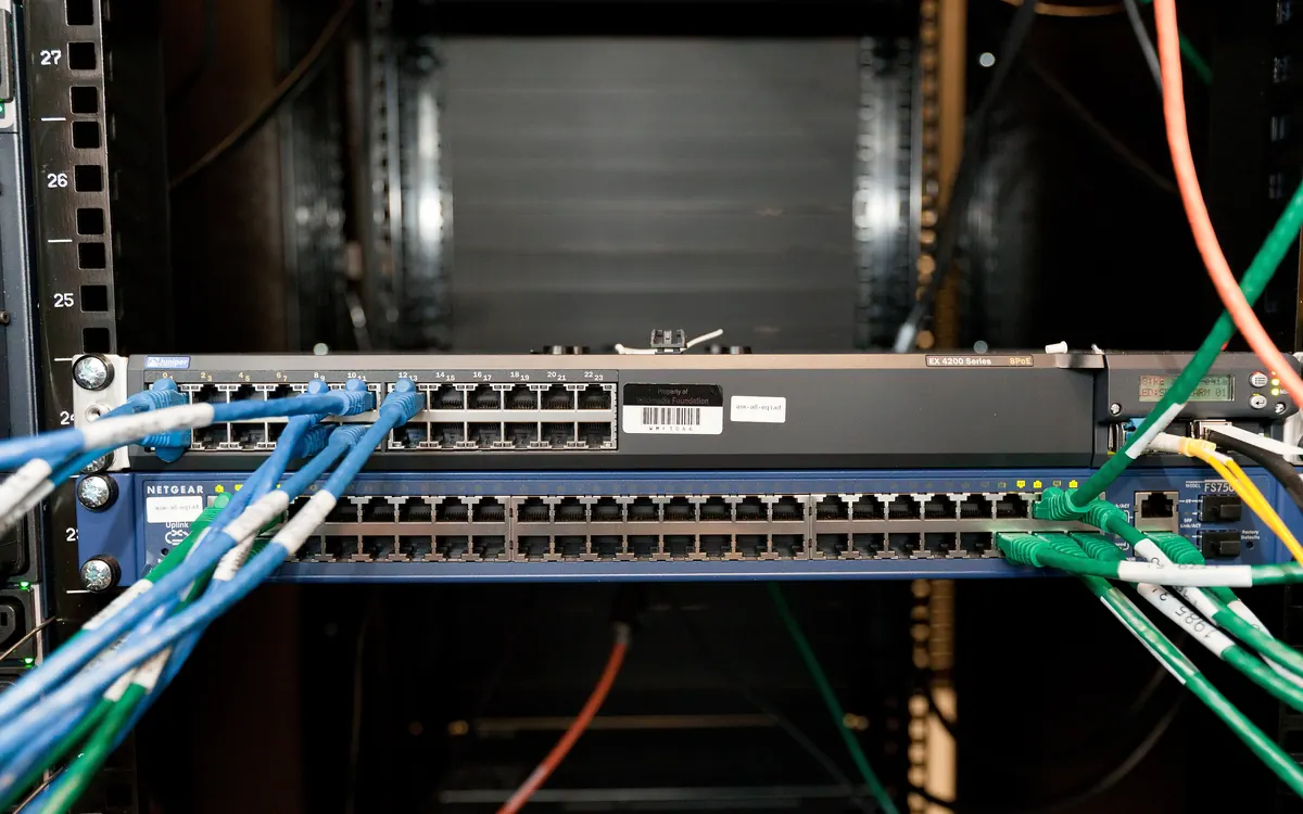 Racks of servers in a data center (illustrative photo)