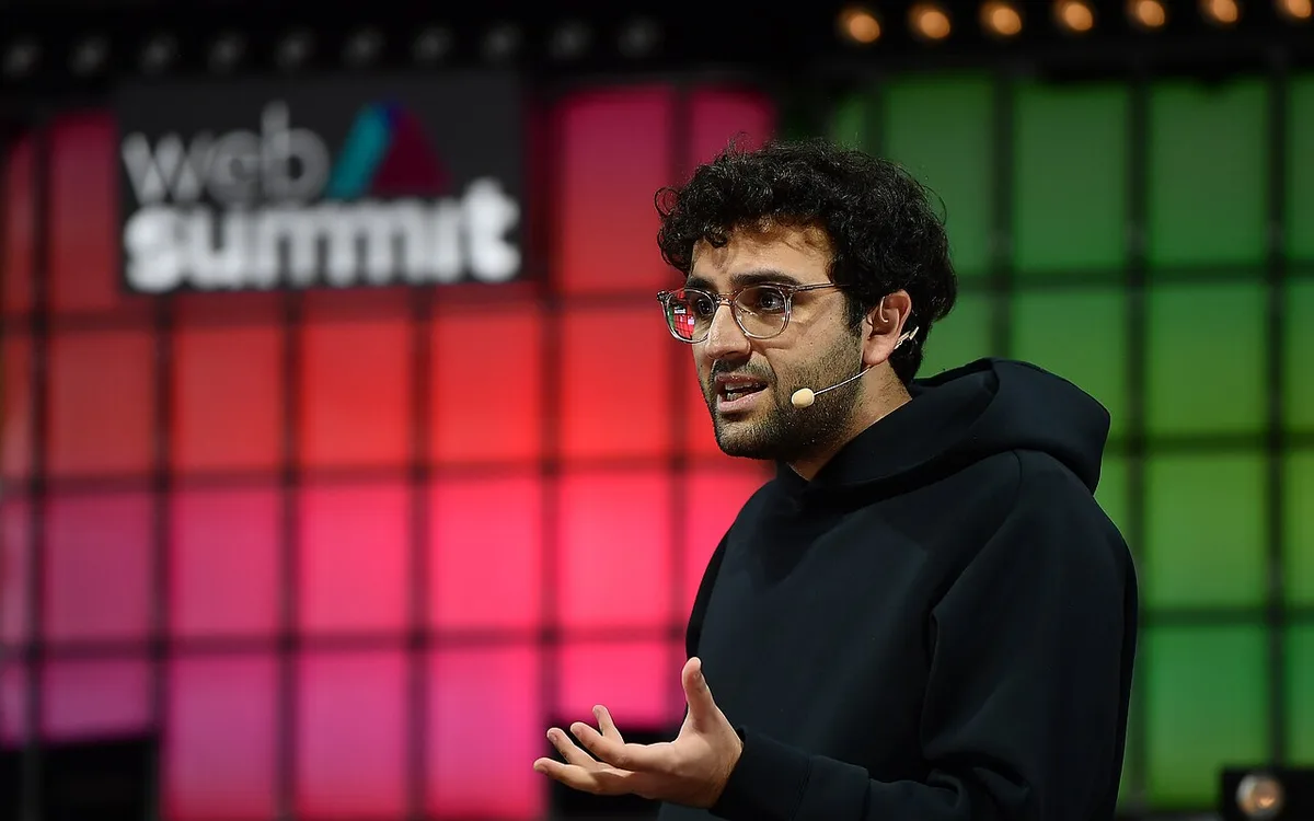 Kalshi co-founder Tarek Mansour speaking on stage at Web Summit 2021 in Lisbon