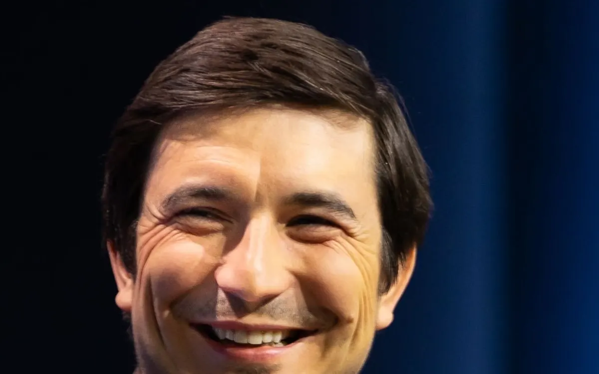 Robinhood co-founder and CEO Vlad Tenev smiling at an event (illustrative photo)