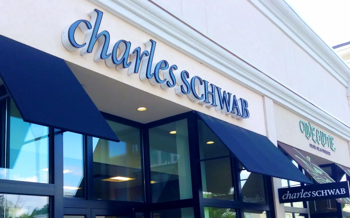 Charles Schwab branch storefront with the company's name above the entrance in Manchester, Connecticut