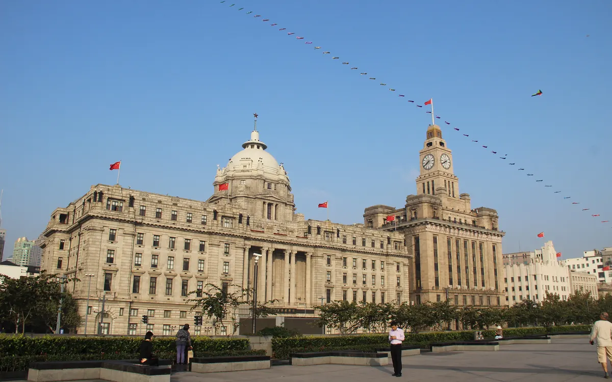 Historic Bund buildings in Shanghai: the former HSBC building and the Customs House clock tower (illustrative photo)