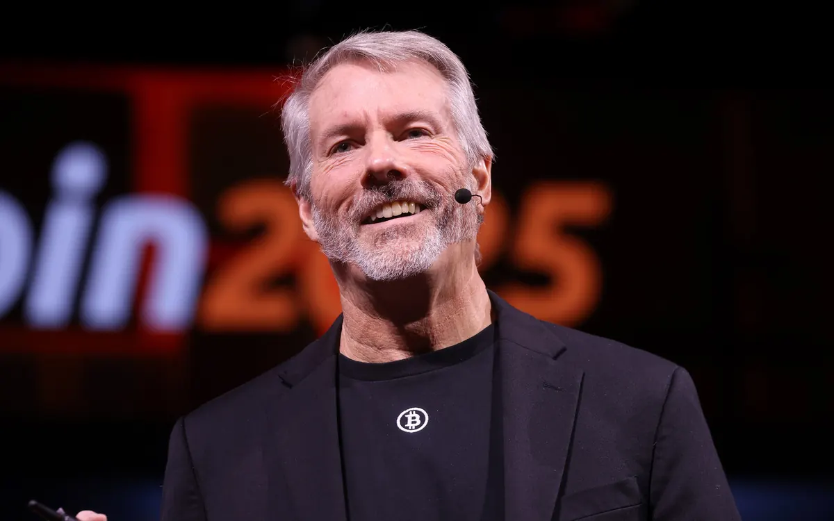 Strategy executive chairman Michael Saylor smiling on stage at the Bitcoin 2025 conference