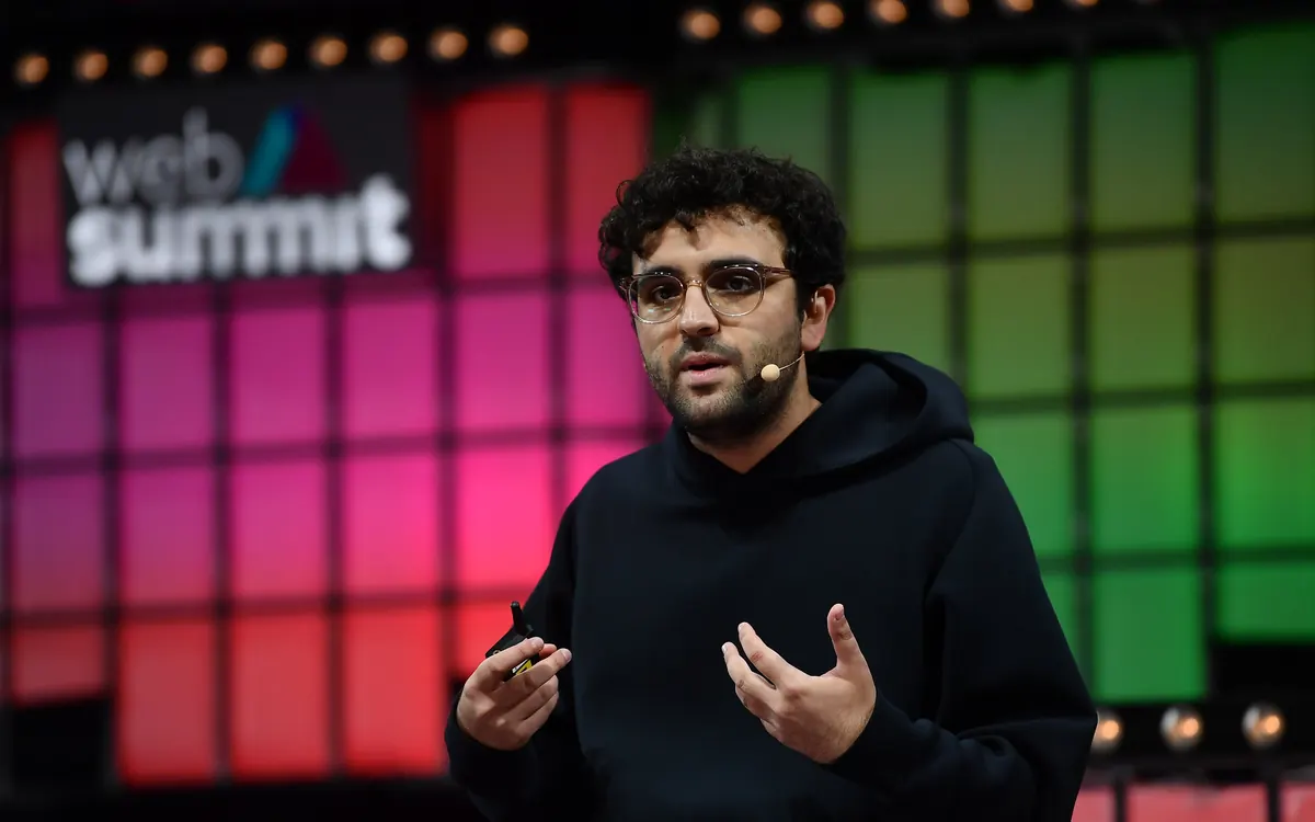 Kalshi co-founder and CEO Tarek Mansour speaking on stage at Web Summit 2021